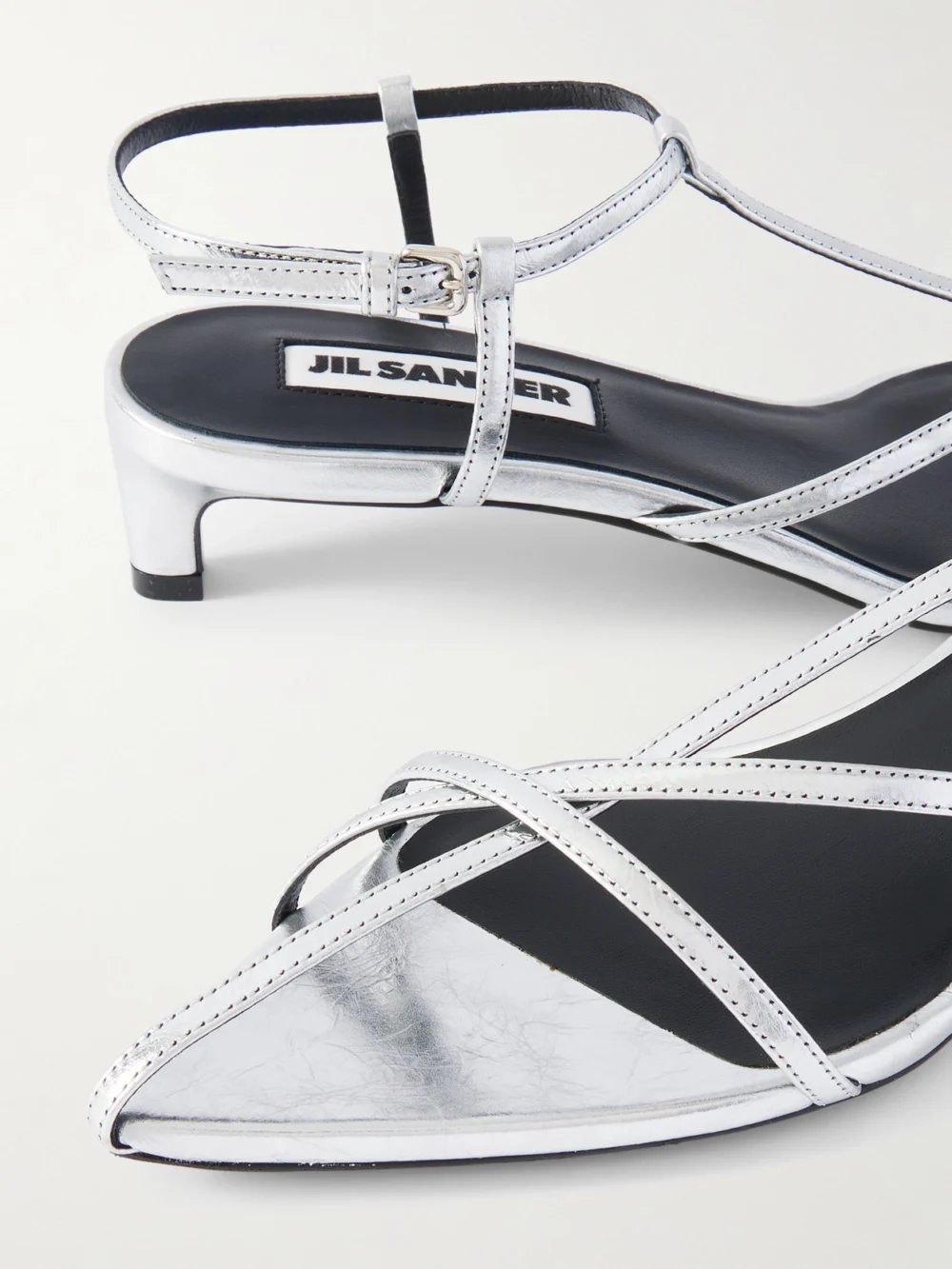 Close-up detail of the Jil Sander Metallic Leather Sandals