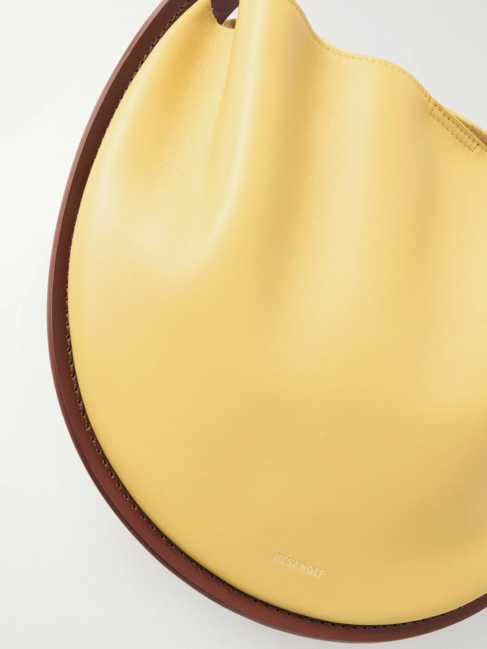 Close-up detail of the Jil Sander Pivot Leather Shoulder Bag