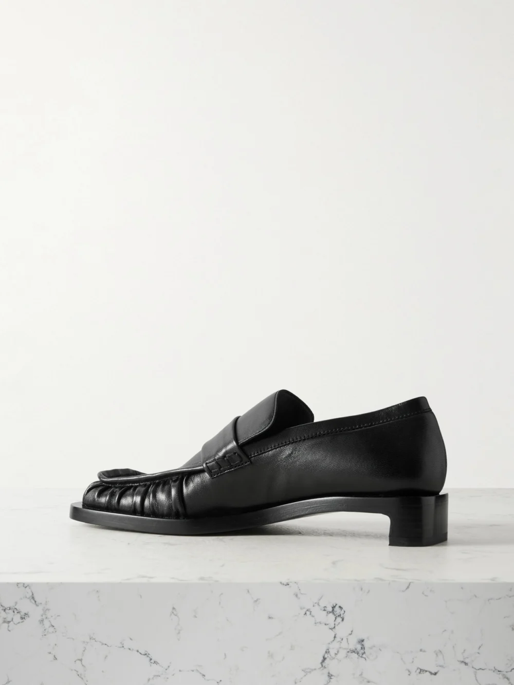 Back view of the Jil Sander Ruched Crinkled-leather Penny Loafers