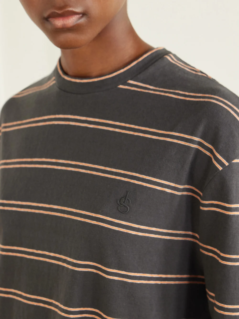 Close-up detail of the Jil Sander Striped Cotton T-shirt