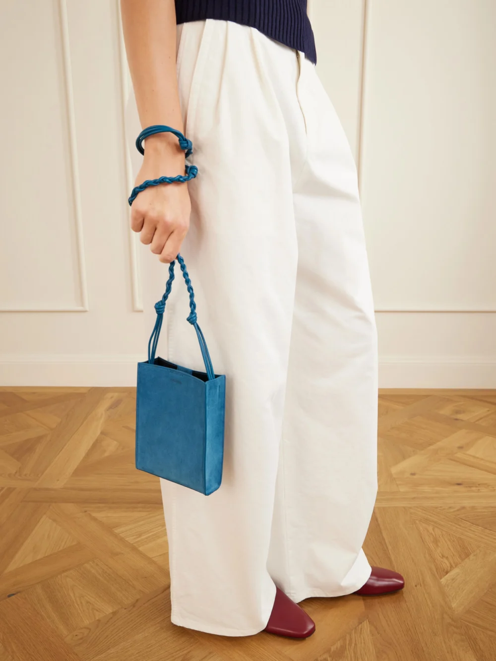 Jil Sander Tangle Small Leather-trimmed Suede Shoulder Bag, styled view