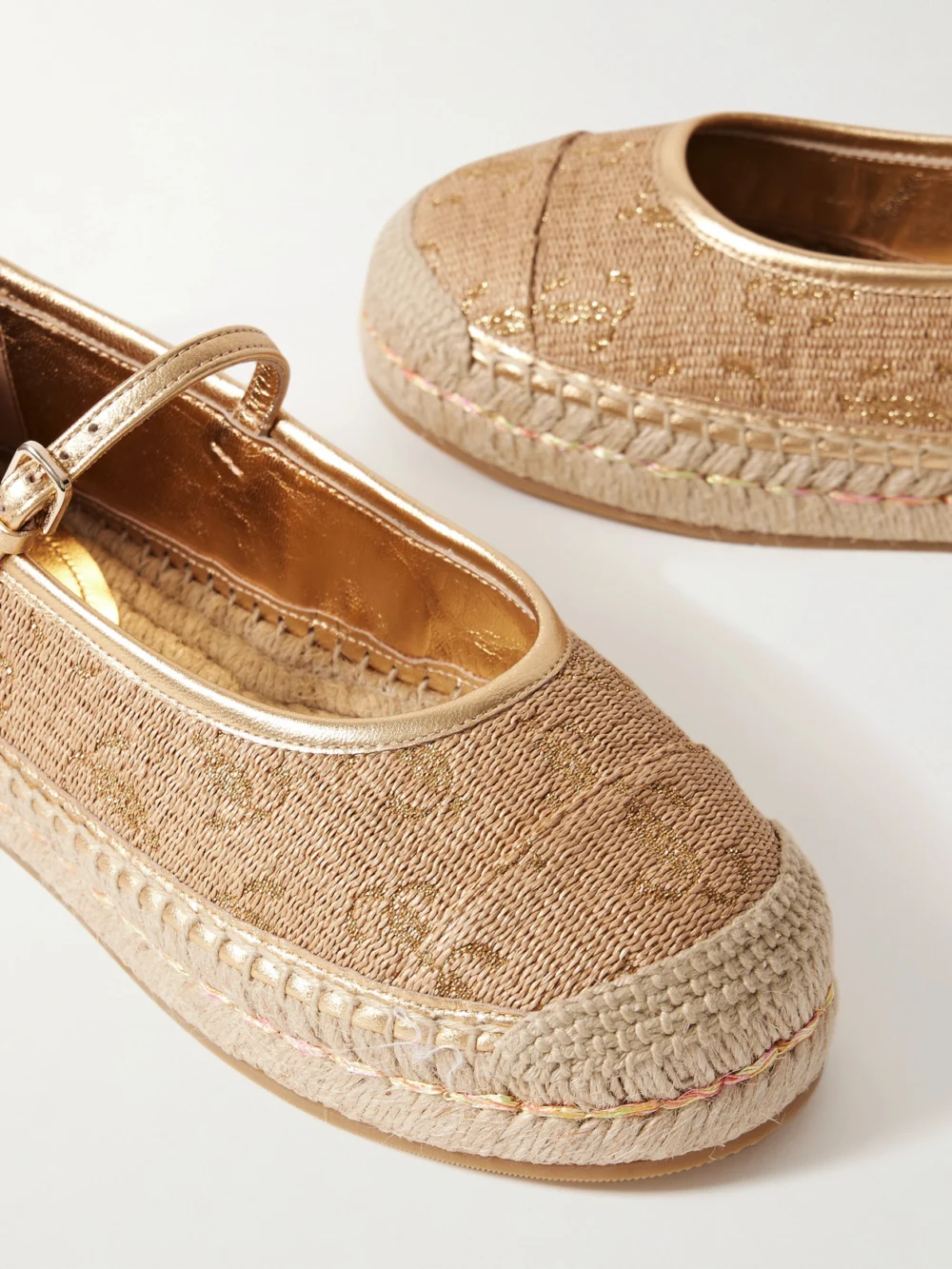 Close-up detail of the Jimmy Choo 20 Metallic Leather-trimmed Logo-embroidered Straw Platform Espadrilles