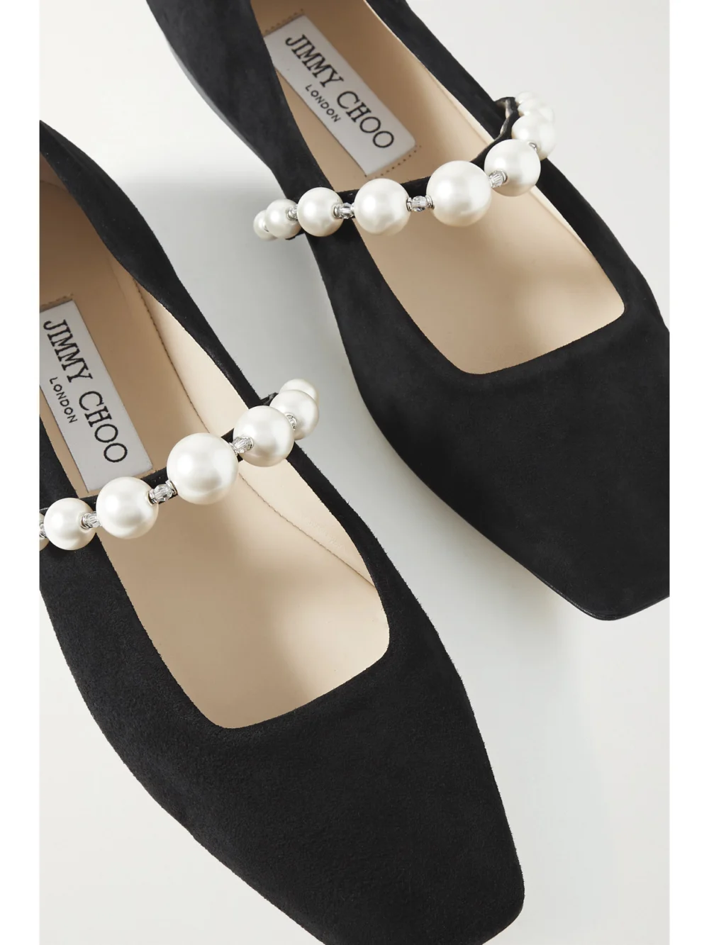 Close-up detail of the Jimmy Choo Ade Embellished Suede Ballet Flats