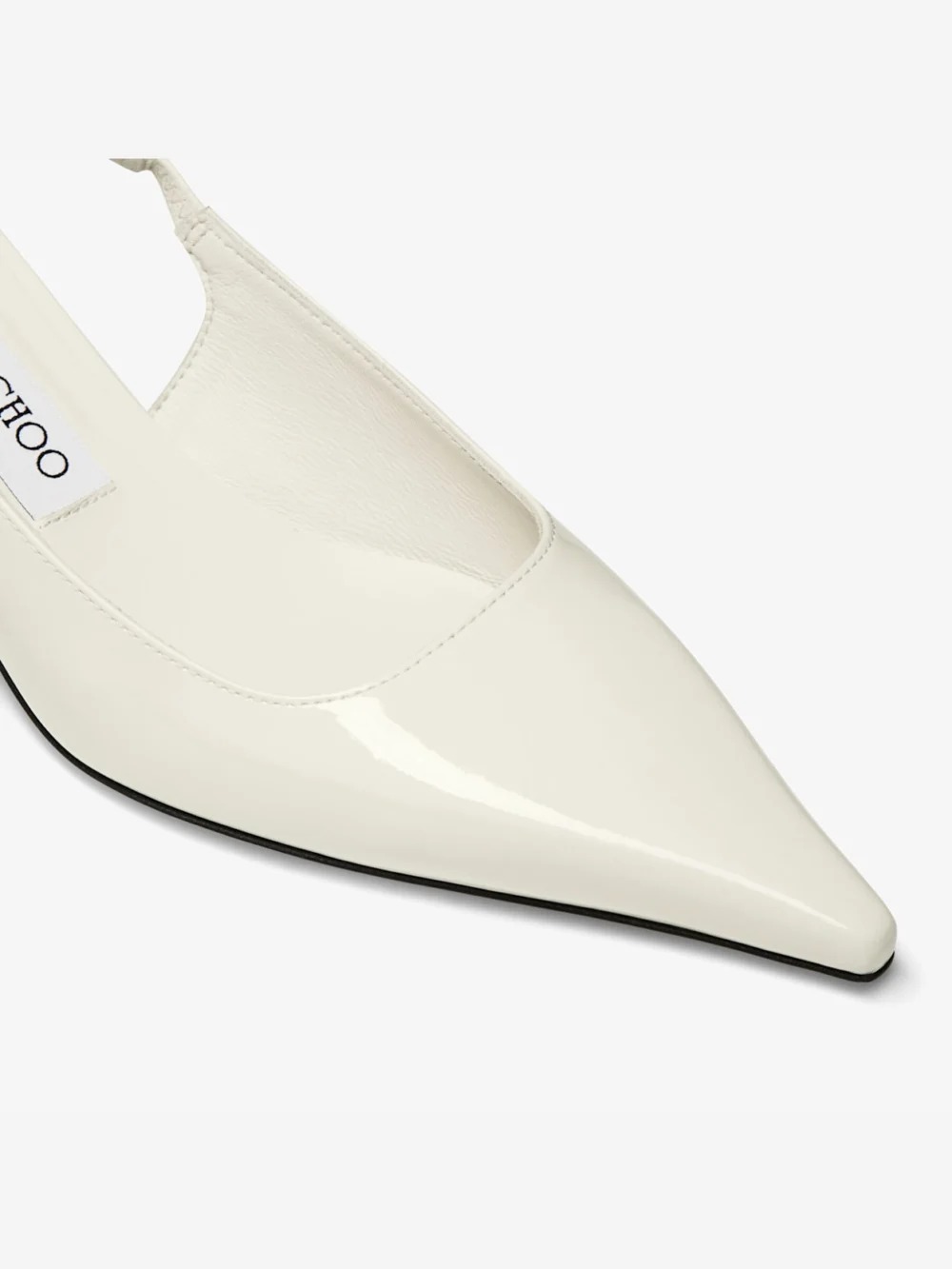 Close-up detail of the Jimmy Choo Amel 50 Latte Patent Leather Pumps