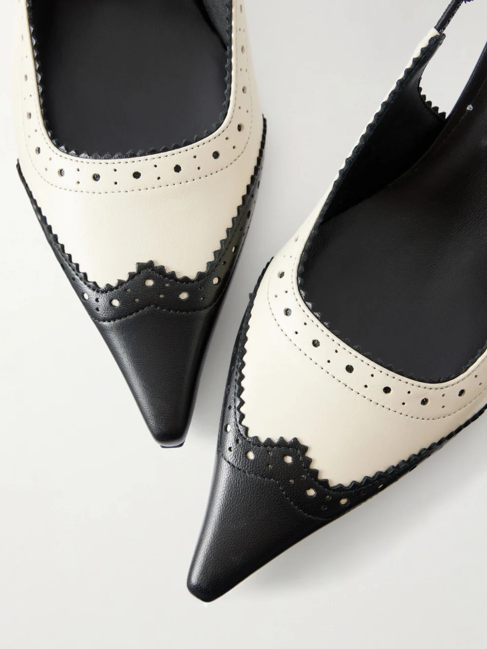 Close-up detail of the Jimmy Choo Amel 50 Two-tone Leather Slingback Pumps