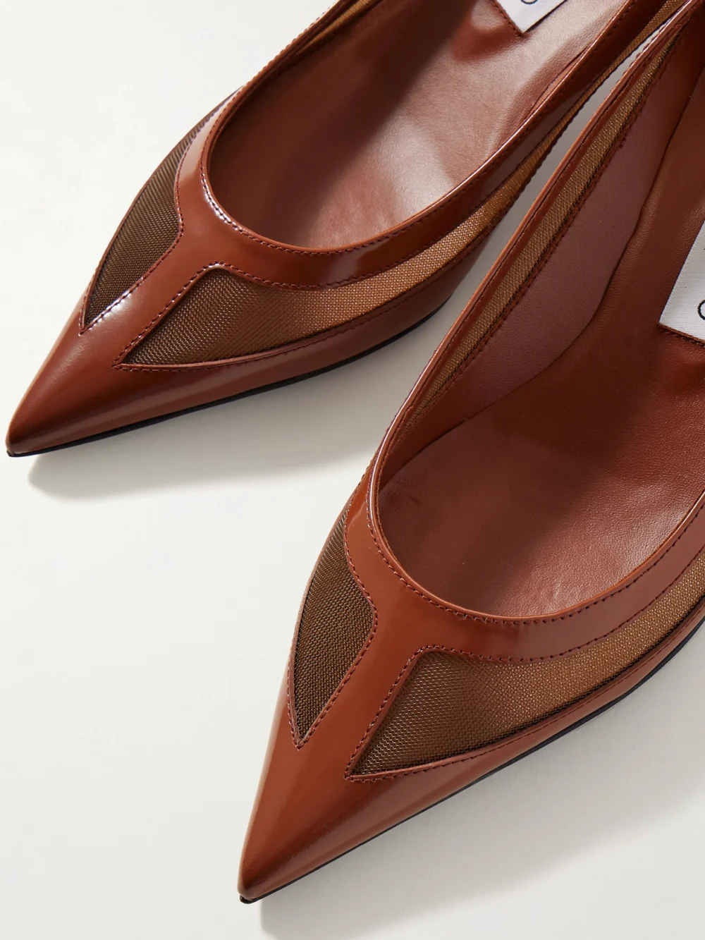 Close-up detail of the Jimmy Choo Amelia 30 Mesh-trimmed Leather Pumps