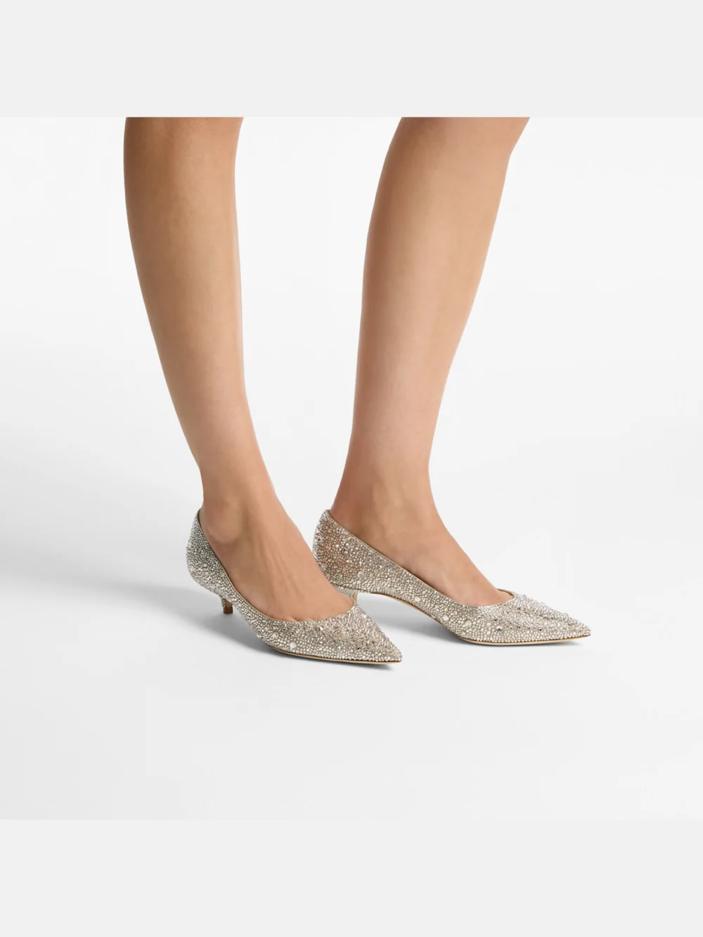 Side view of the Jimmy Choo Amelia Light Soft Gold Shimmer Suede Pumps with Crystal Hotfix