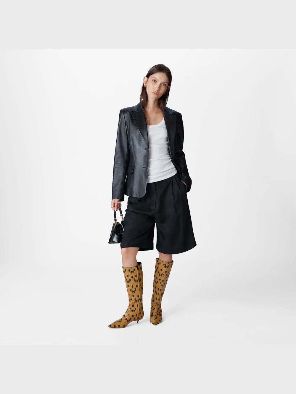 Side view of the Jimmy Choo Amis Knee Boot 35 Cigar and Black Spotty Elaphe Printed Leather Knee High Boots