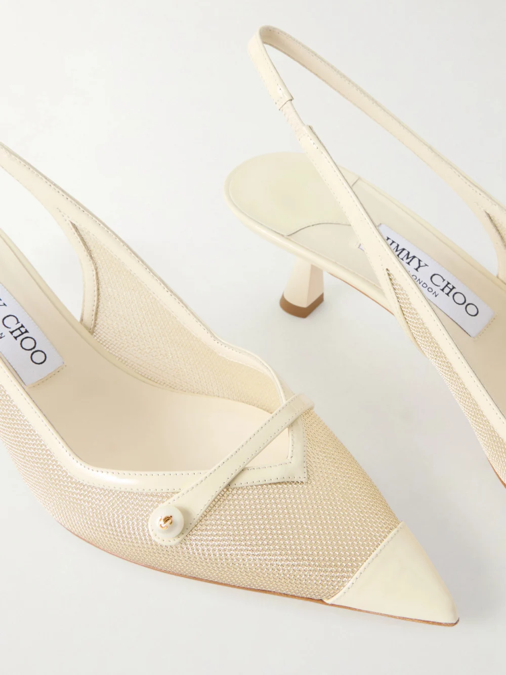 Close-up detail of the Jimmy Choo Amita 45 Embellished Patent-leather Trimmed Metallic Mesh Slingback Pumps