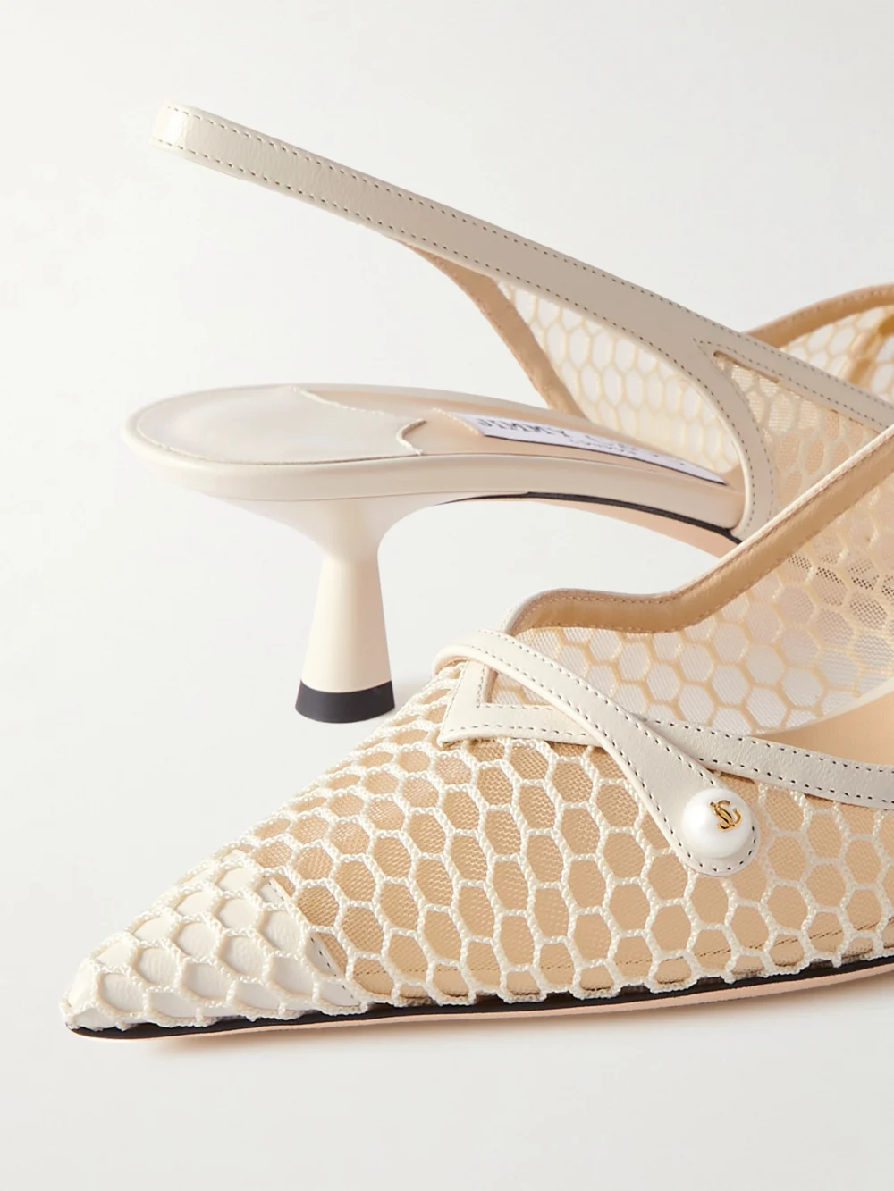 Close-up detail of the Jimmy Choo Amita 45 Faux-pearl Embellished Leather-trimmed Mesh Slingback Pumps