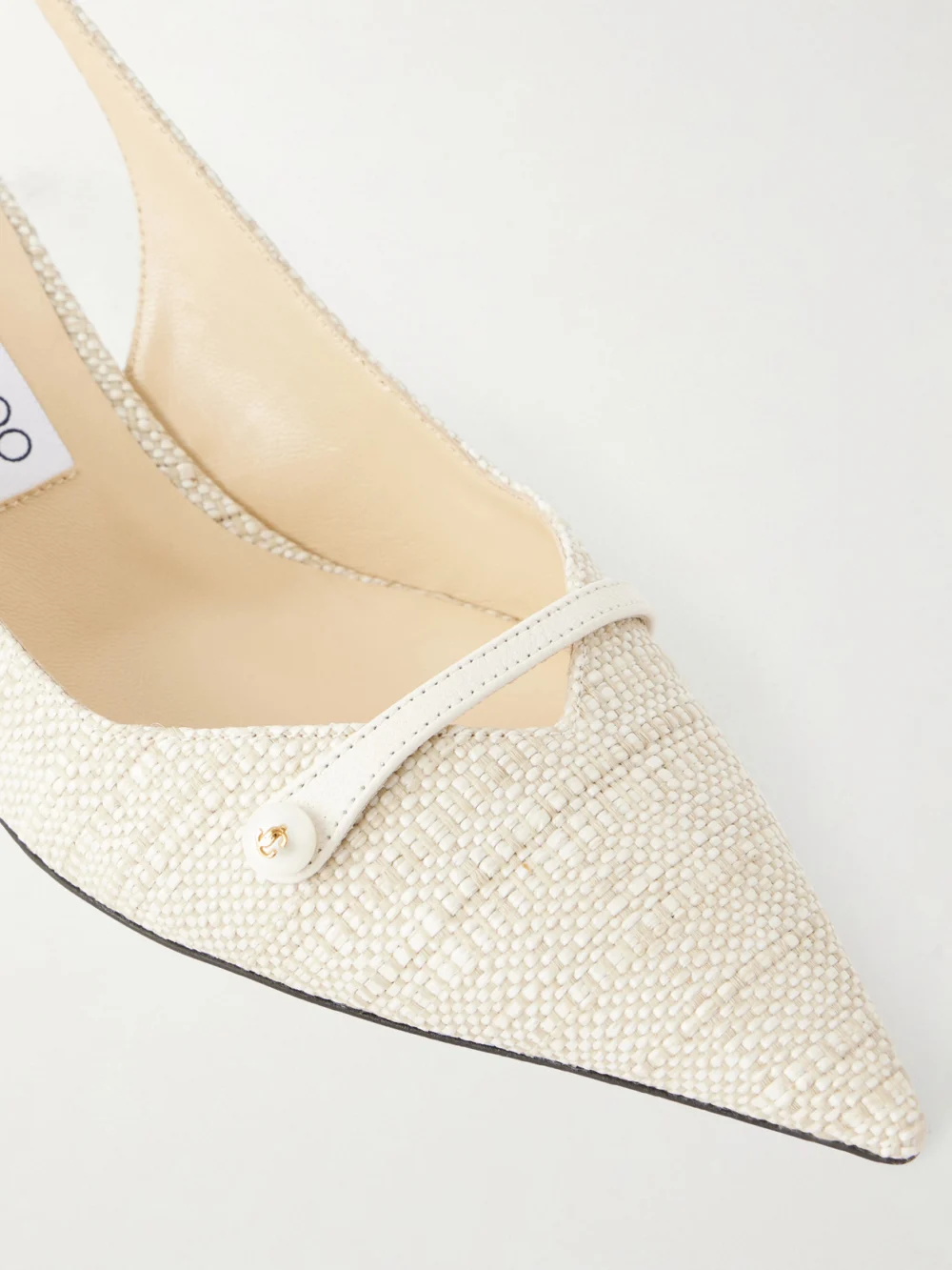 Close-up detail of the Jimmy Choo Amita 45 Pearl-embellished Slingback Pumps