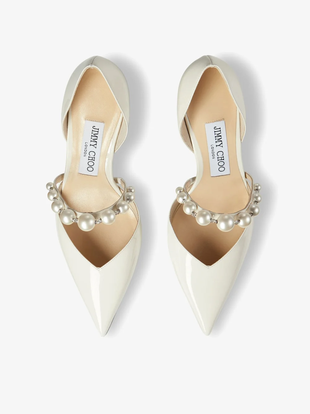 Back view of the Jimmy Choo Aurelie 65 Latte Patent Leather Pointed Pumps with Pearl Embellishment