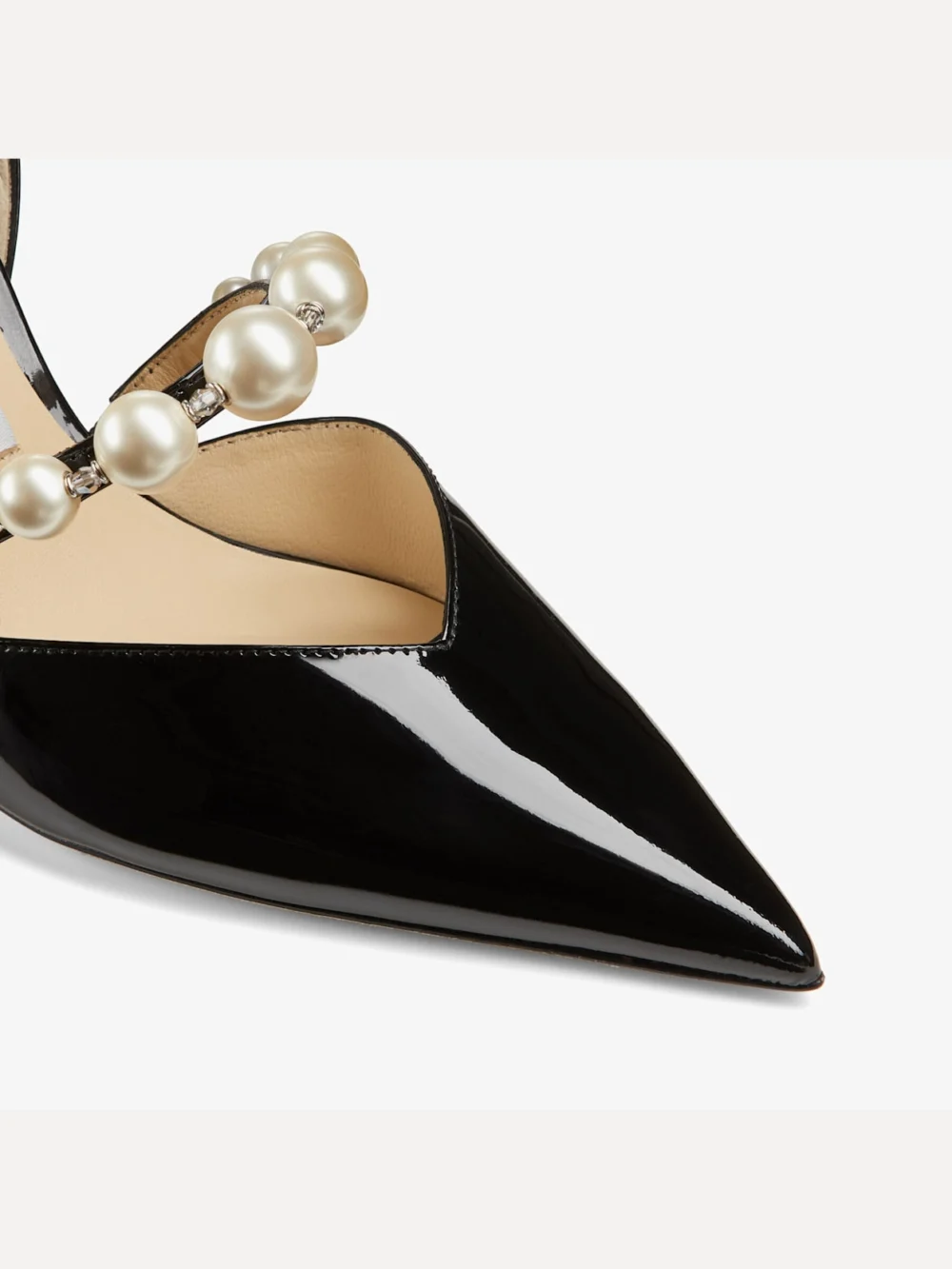 Close-up detail of the Jimmy Choo Aurelie 85 Black Patent Leather Pointed Pumps with Pearl Embellishment