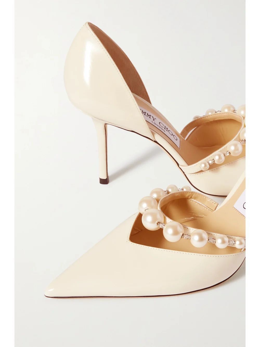 Close-up detail of the Jimmy Choo Aurelie 85 Faux Pearl-embellished Patent-leather Pumps