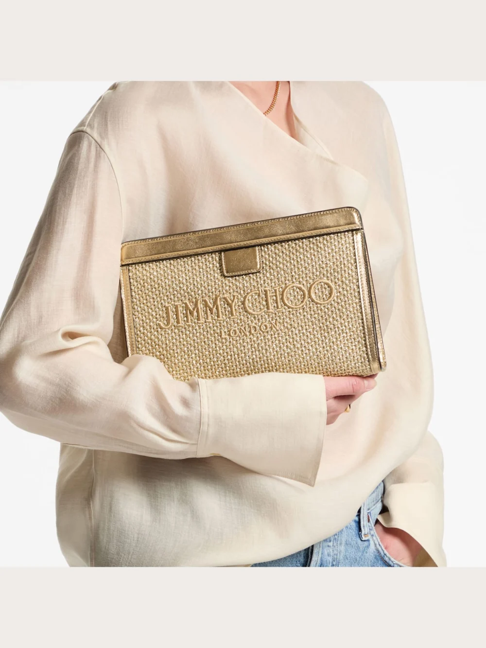 Side view of the Jimmy Choo Avenue Pouch Gold and Dark Cappuccino Metallic Embroidered Raffia Pouch