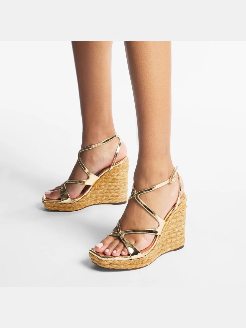 Side view of the Jimmy Choo Ayla 110 Gold Metallic Leather Wedge