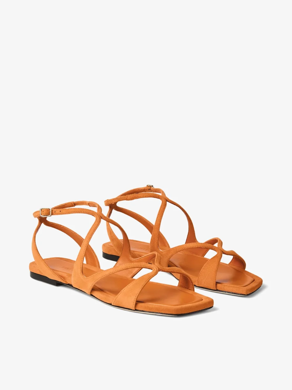 Close-up detail of the Jimmy Choo Ayla Flat Sunset Orange Suede Flat Sandals
