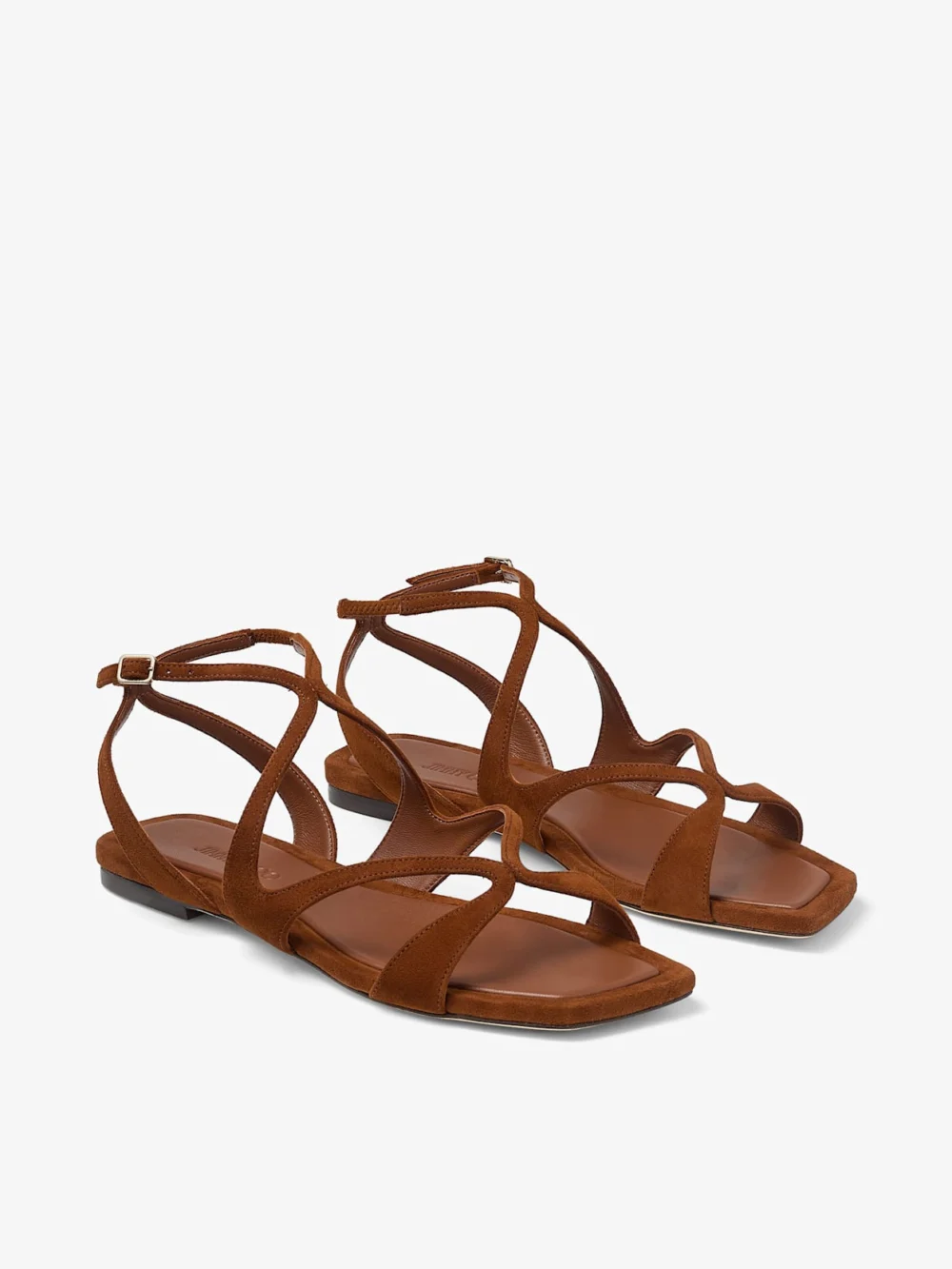 Close-up detail of the Jimmy Choo Ayla Flat Tan Suede Flats