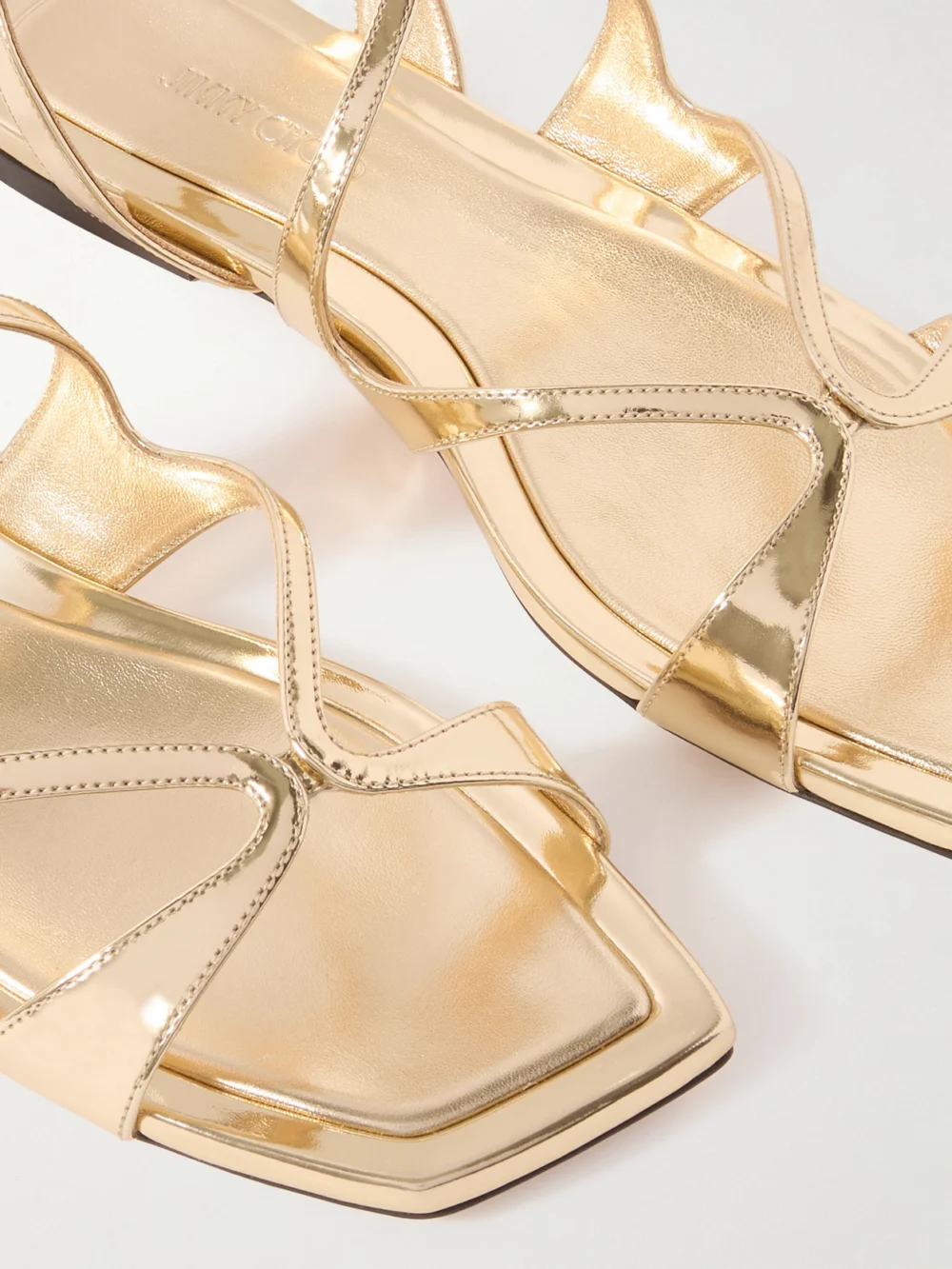 Close-up detail of the Jimmy Choo Ayla Metallic Leather Sandals