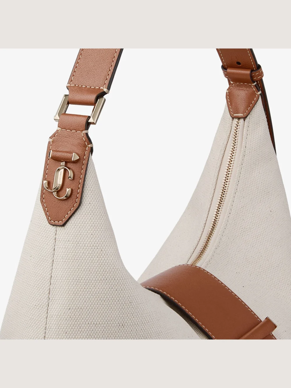 Back view of the Jimmy Choo Bar Hobo Medium Natural and Tan Recycled Canvas Shoulder Bag with Biker Leather Trim