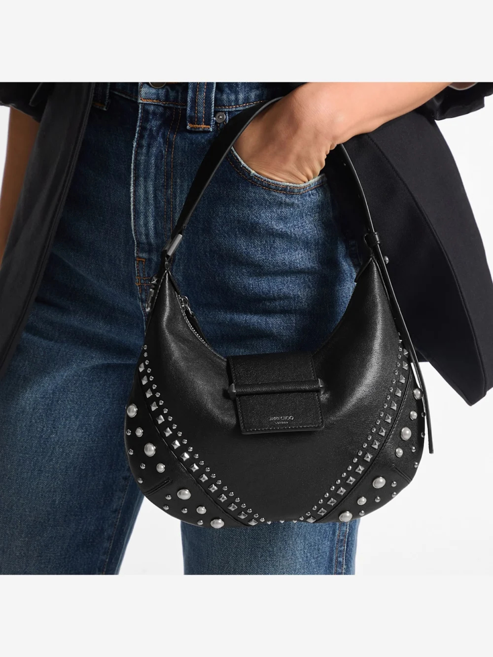 Side view of the Jimmy Choo Bar Hobo Small Black Biker Leather Shoulder Bag with Pearl Studs