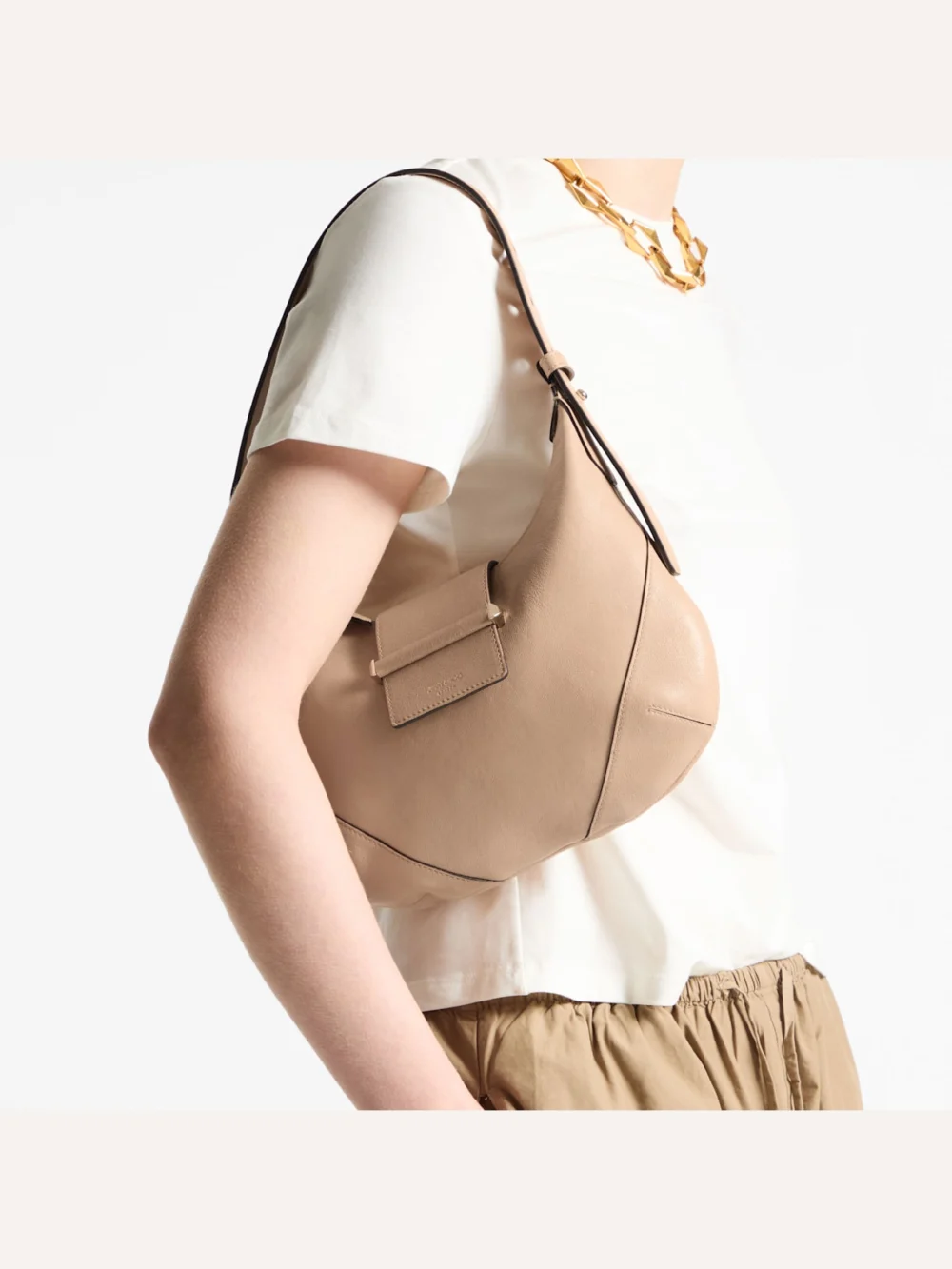 Side view of the Jimmy Choo Bar Hobo Small Chai Biker Leather Shoulder Bag