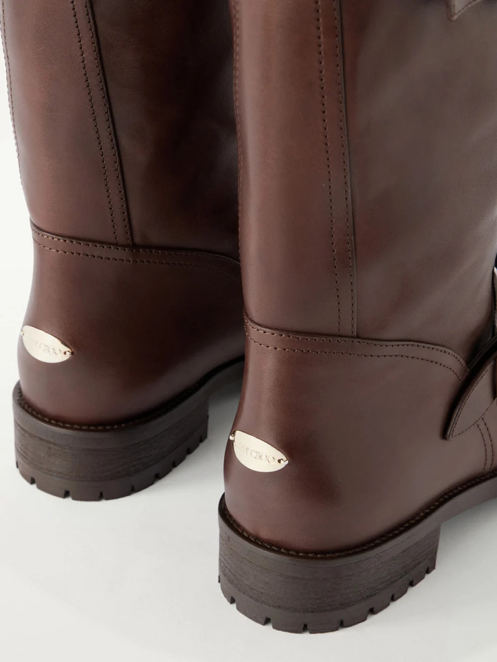 Close-up detail of the Jimmy Choo Biker Buckled Leather Ankle Boots