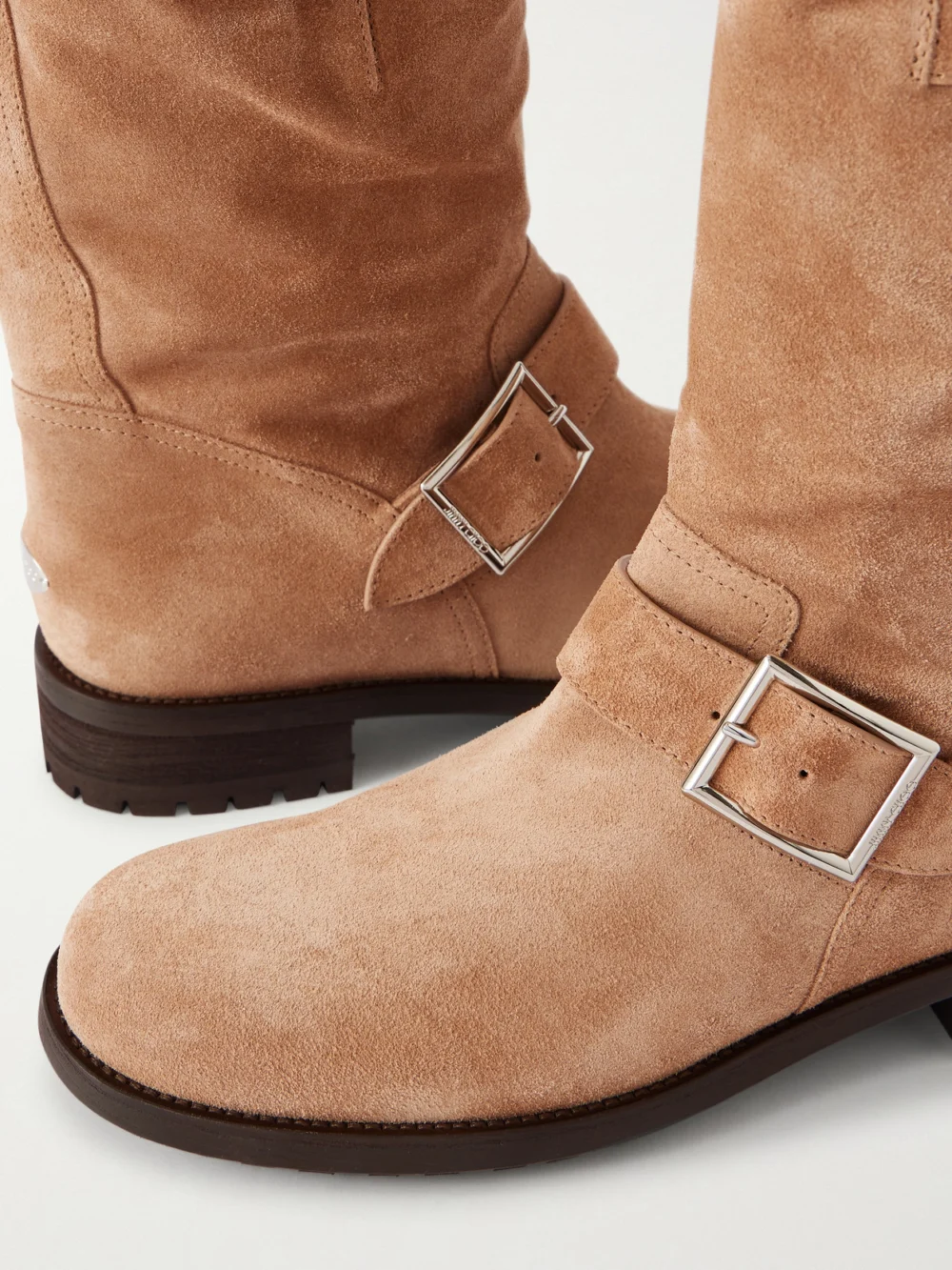 Close-up detail of the Jimmy Choo Biker Buckled Suede Ankle Boots