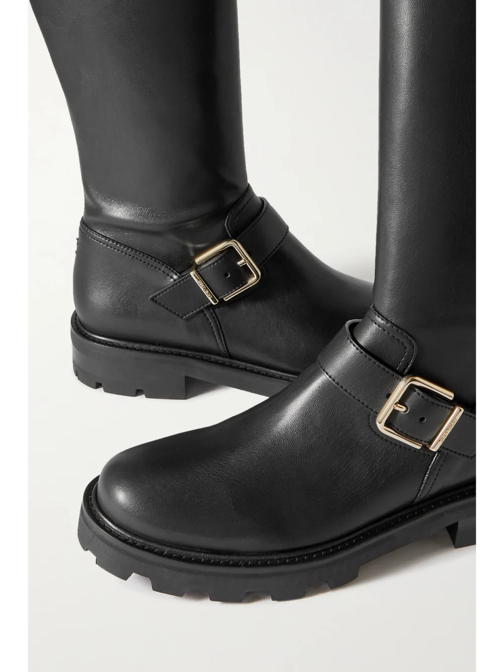 Close-up detail of the Jimmy Choo Biker Ii Buckled Leather Over-the-knee Boots