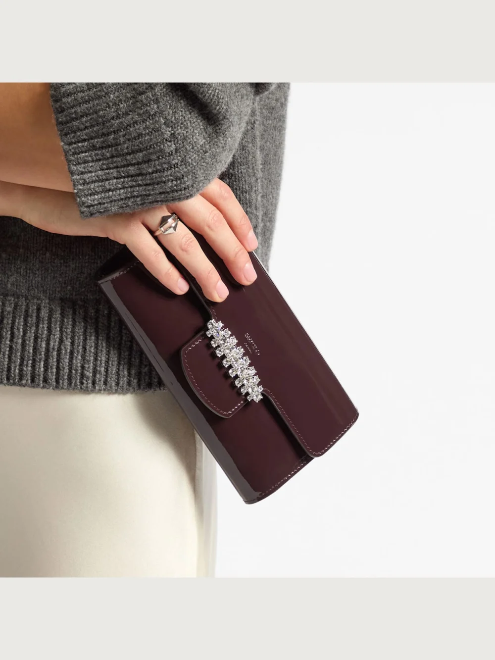 Side view of the Jimmy Choo Bing Wallet with Chain Deep Merlot Soft Patent Leather Mini Bag with Crystal Piece