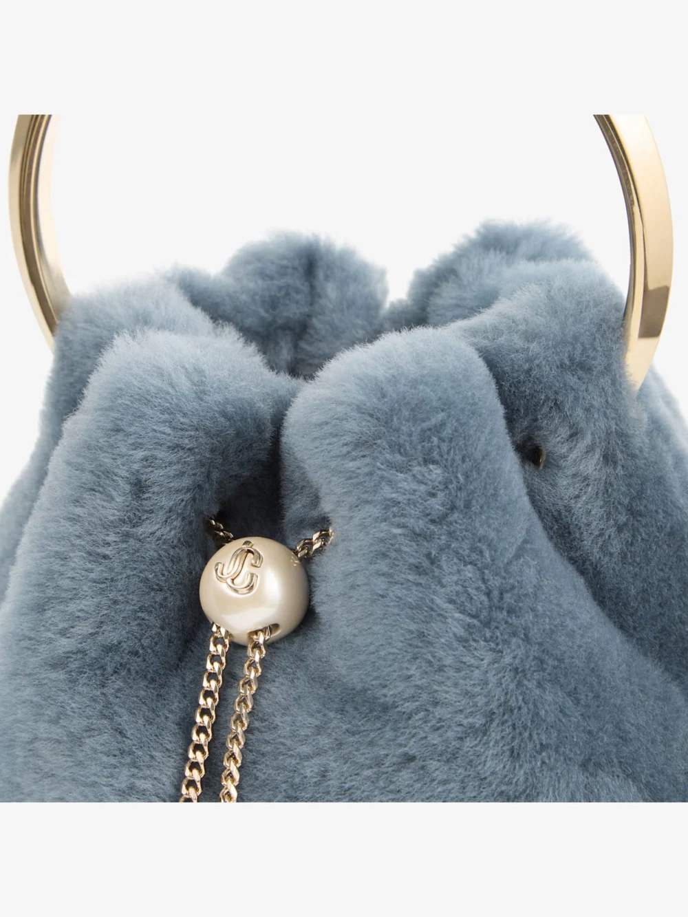Back view of the Jimmy Choo Bon Bon Arctic Blue Shearling Bucket Bag
