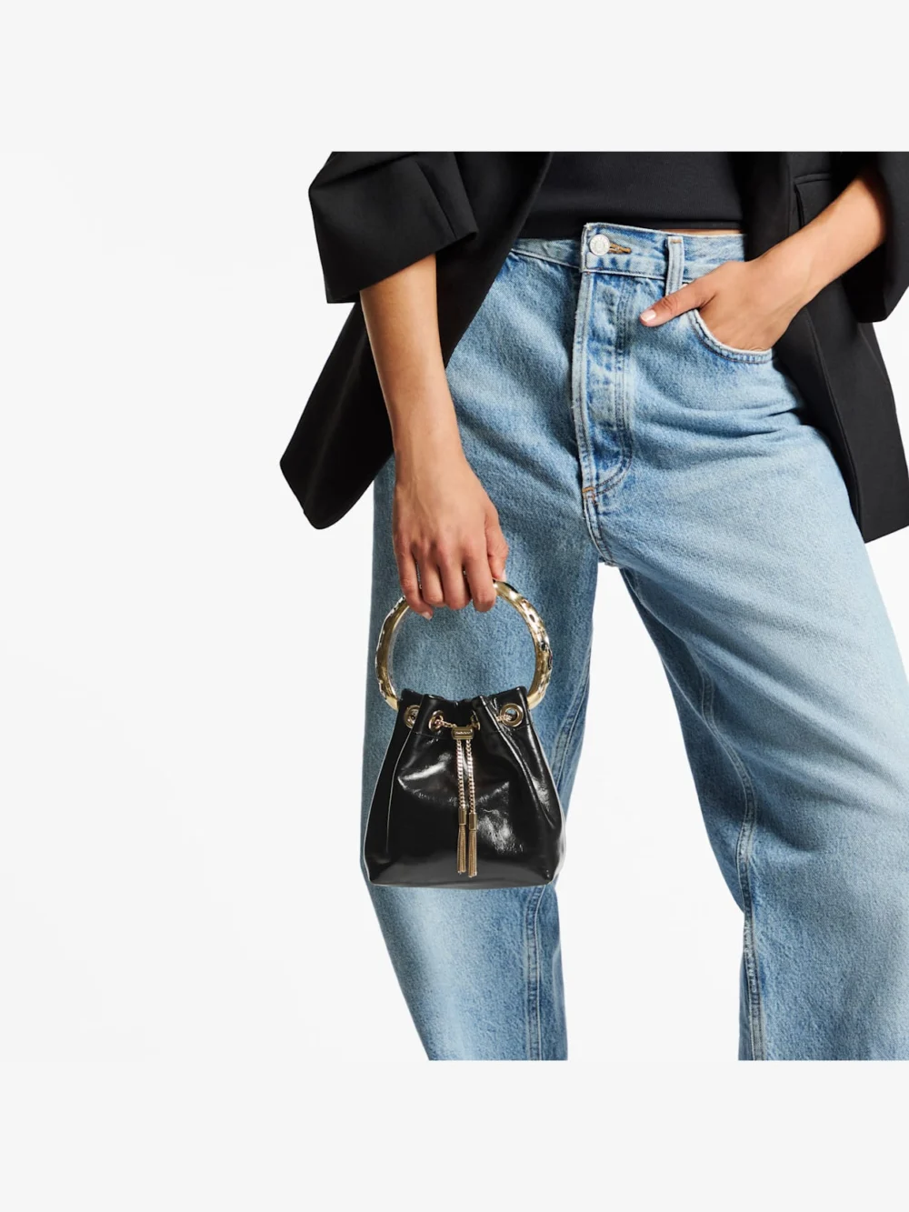 Side view of the Jimmy Choo Bon Bon Black and Multi Shiny Biker Leather Bucket Bag with Organic Crystal Handle