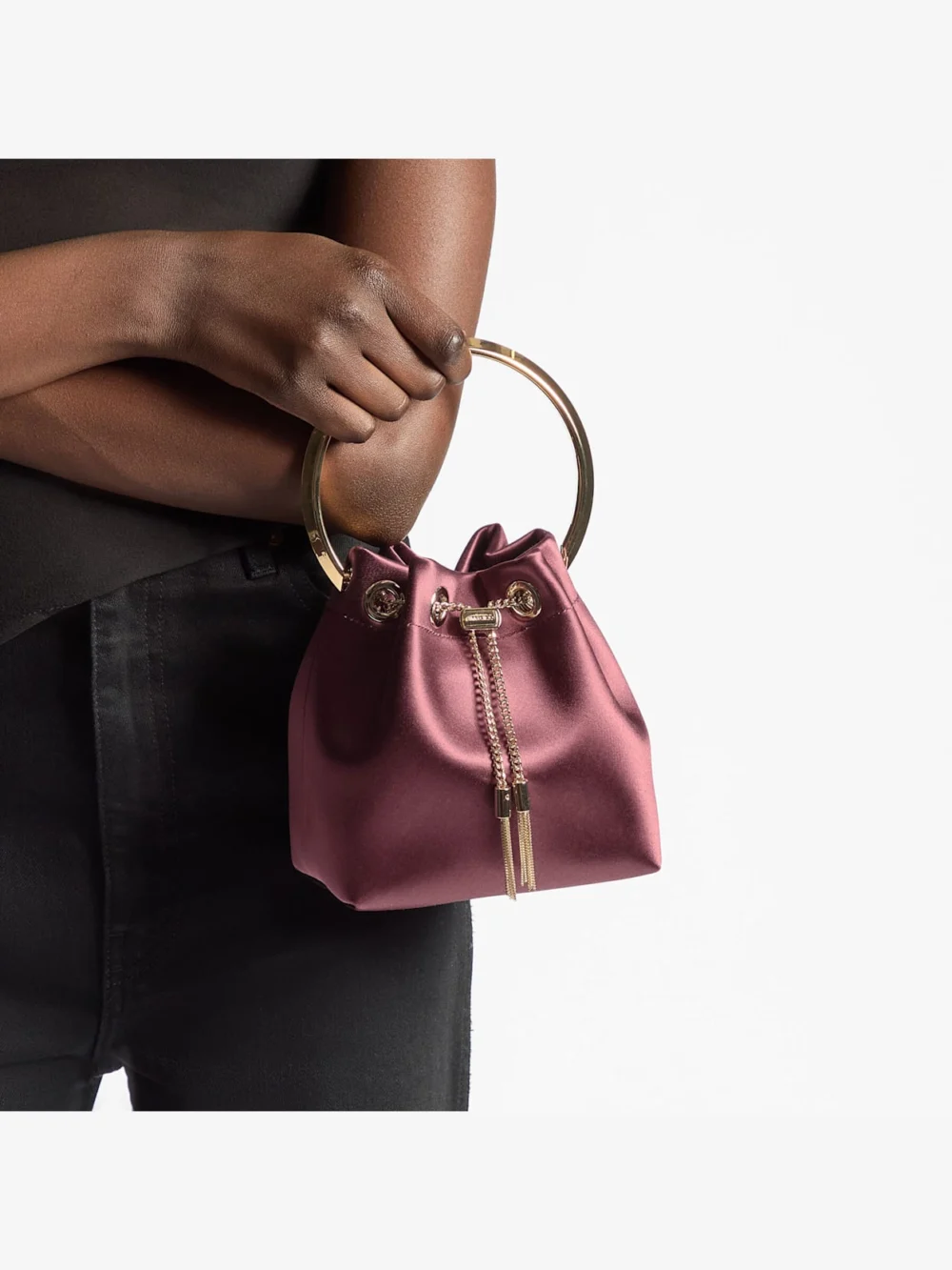 Side view of the Jimmy Choo Bon Bon Deep Merlot Satin Handbag with Metal Handle