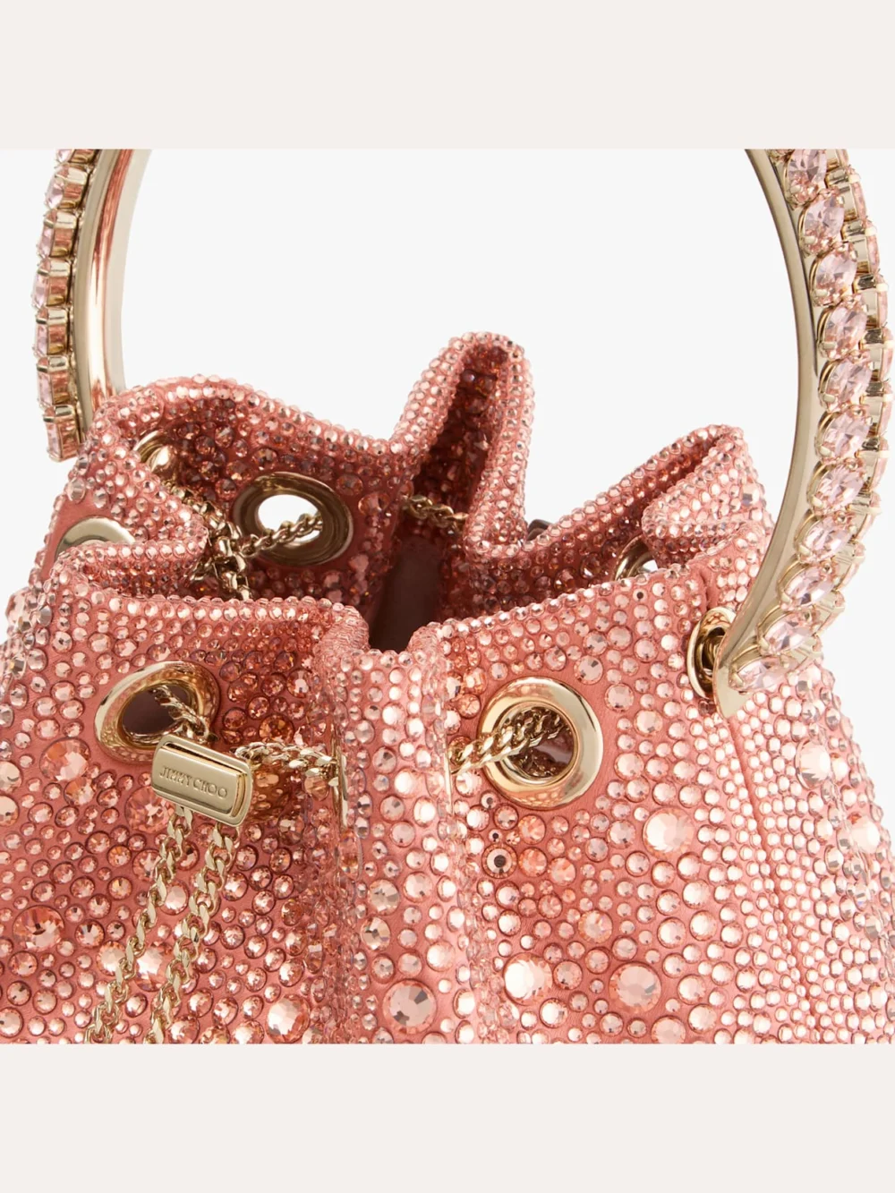Back view of the Jimmy Choo Bon Bon Grapefruit Satin Bucket Bag with Crystal Embellishment and Crystal Handle