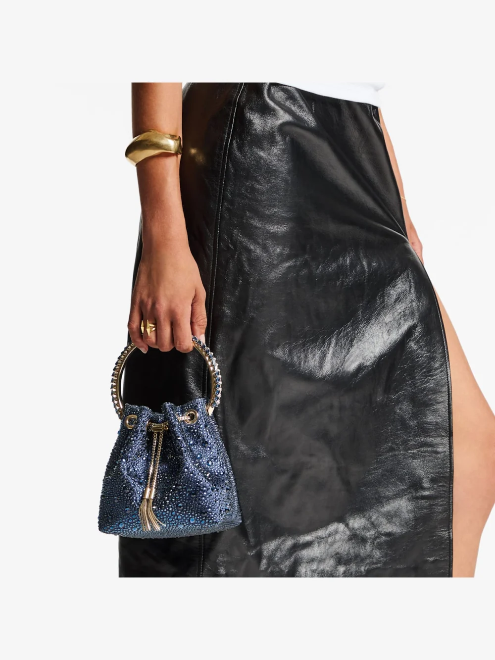 Side view of the Jimmy Choo Bon Bon Marine Satin and Crystal Hotfix Bucket Bag with Crystal Handle