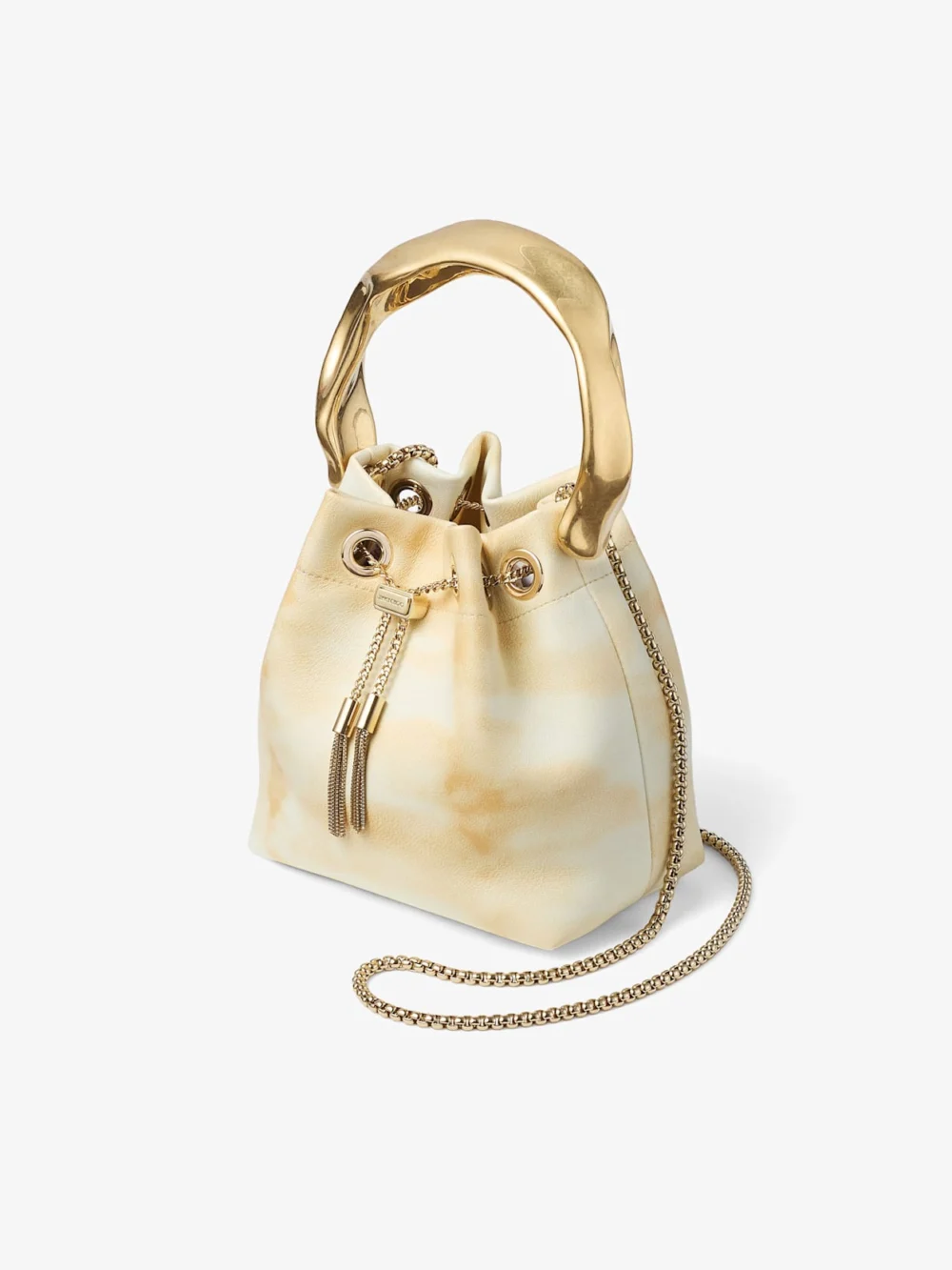 Close-up detail of the Jimmy Choo Bon Bon Natural Mix Tie Dye Leather Bucket Bag with Sculpted Handle