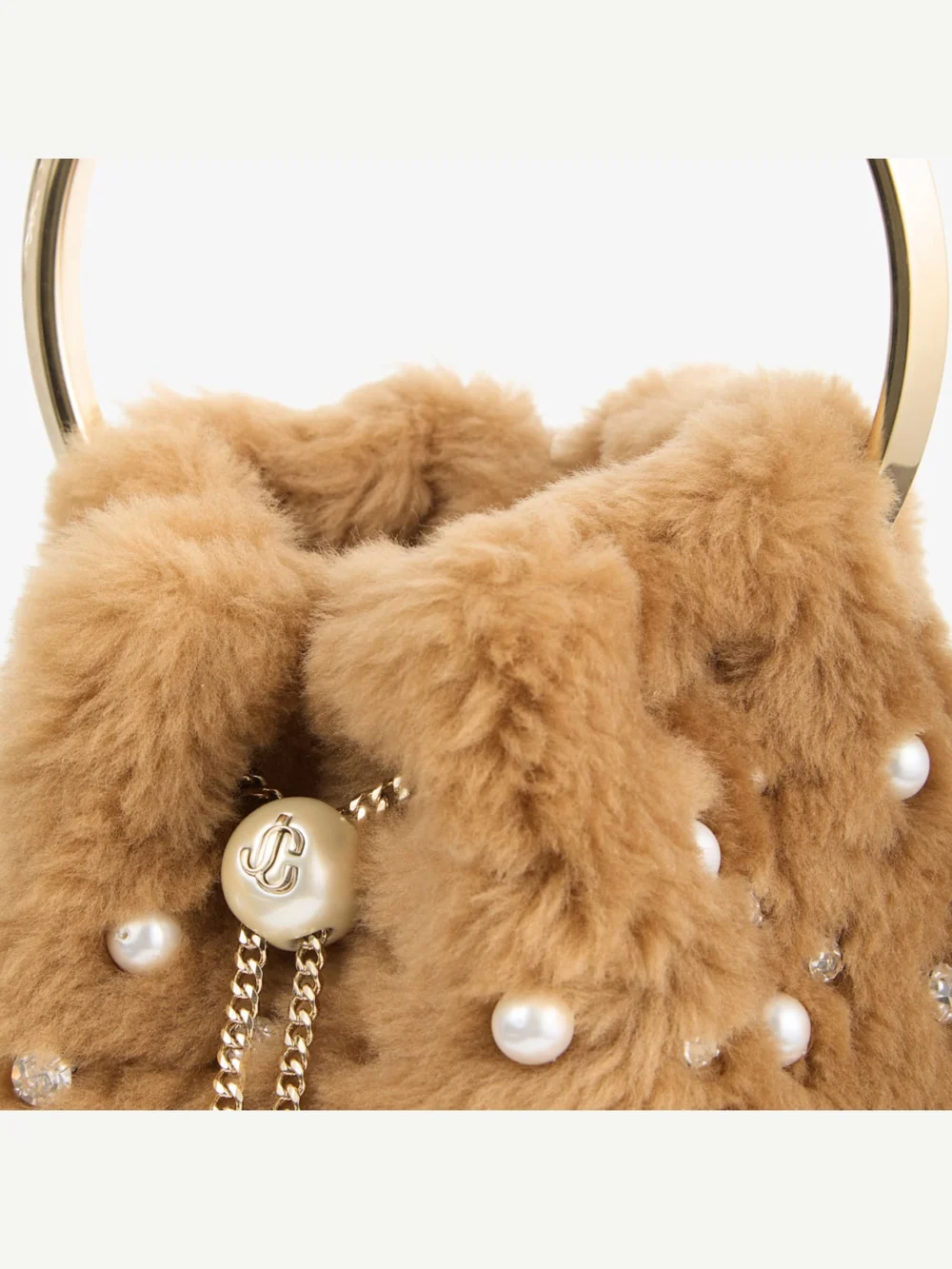 Close-up detail of the Jimmy Choo Bon Bon Toffee Shearling Bucket Bag with Embroidered Pearls and Crystals