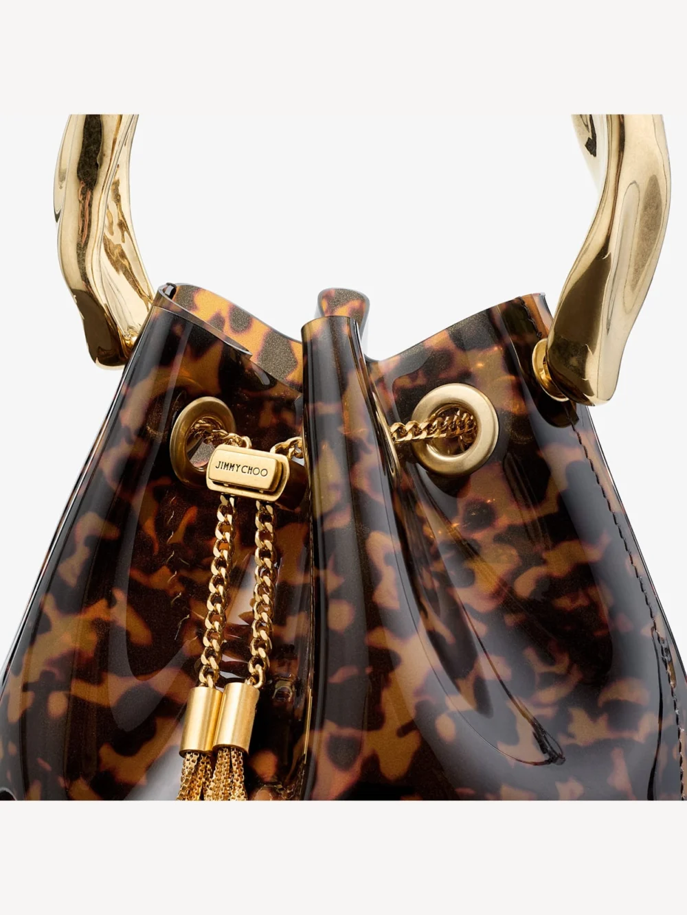 Back view of the Jimmy Choo Bon Bon Transparent Tortoiseshell Bucket Bag with Sculpted Handle