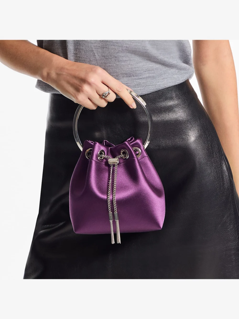 Side view of the Jimmy Choo Bon Bon Winter Bloom Satin Handbag with Metal Bracelet