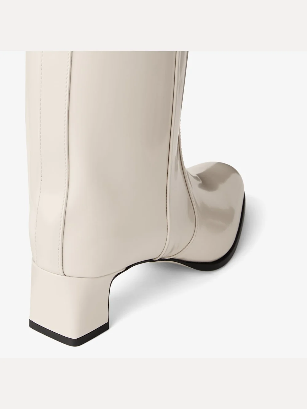 Back view of the Jimmy Choo Caly Mid 45 Bone Polished Calf Leather Ankle Boots