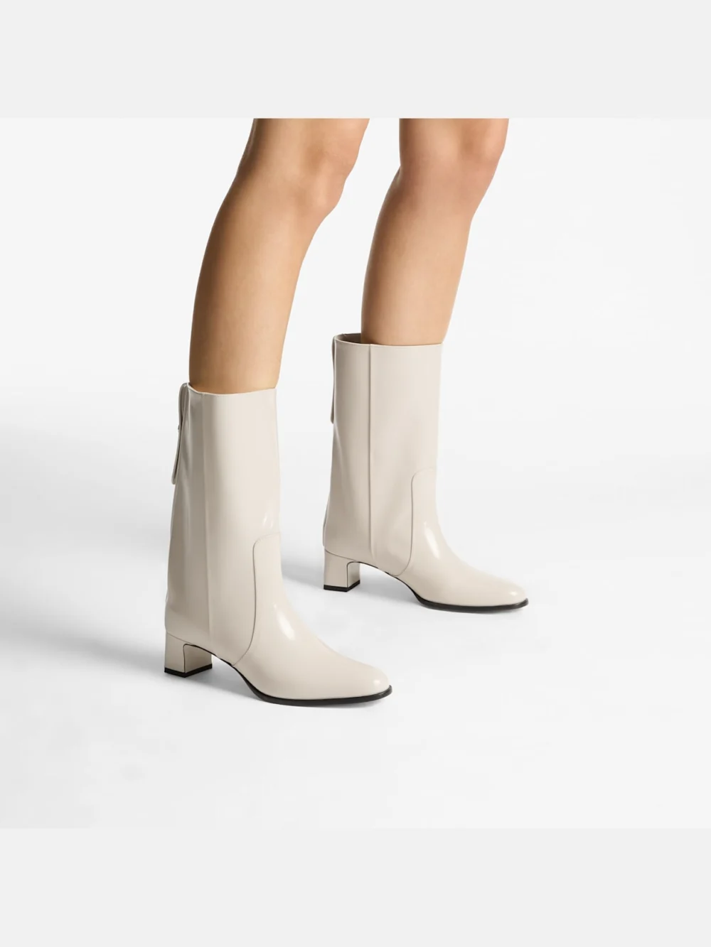 Side view of the Jimmy Choo Caly Mid 45 Bone Polished Calf Leather Ankle Boots