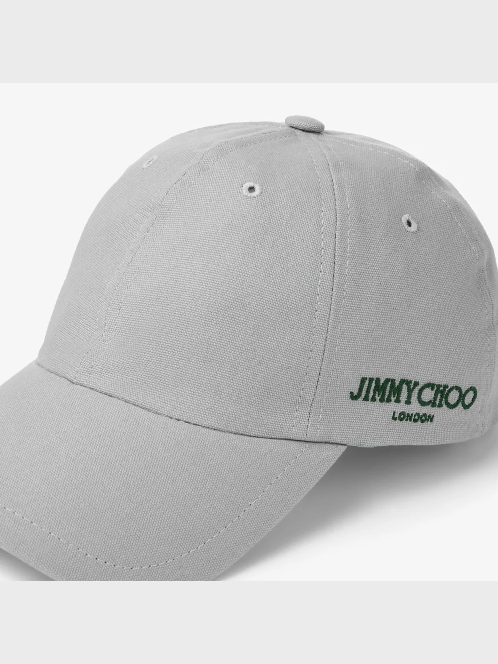 Close-up detail of the Jimmy Choo Cap 85 Grey and British Green Cotton Baseball Cap with Jimmy Choo Logo