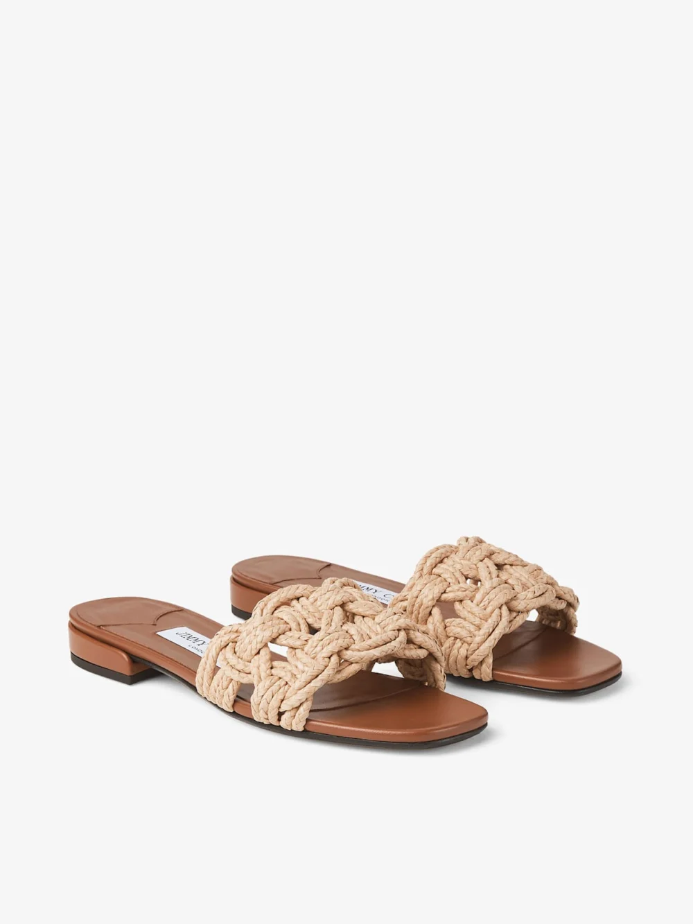 Close-up detail of the Jimmy Choo Chara Flat Tan Leather and Crochet Raffia Slide