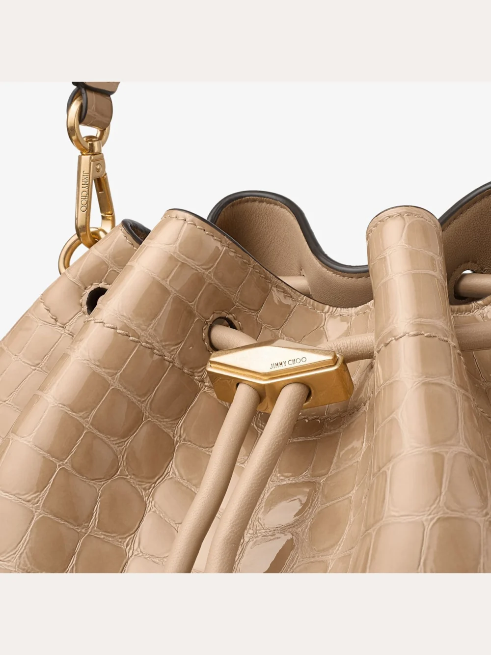 Back view of the Jimmy Choo Cinch Medium Chai Shiny Croc Embossed Leather Shoulder Bag
