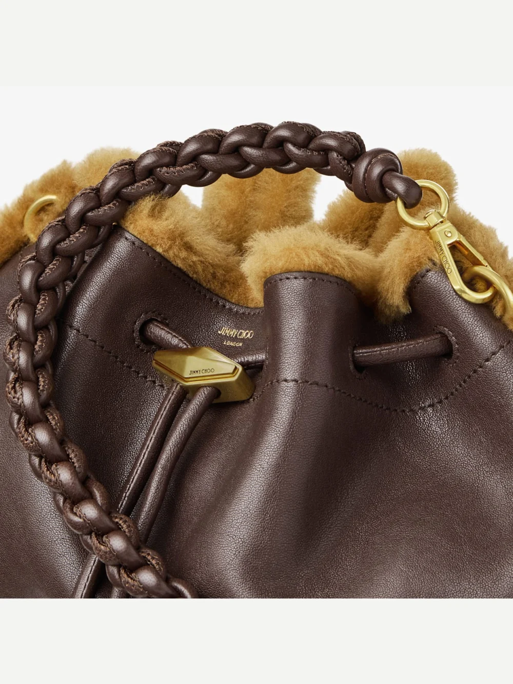 Close-up detail of the Jimmy Choo Cinch Medium Chocolate and Teddy Biker Leather Shoulder Bag with Shearling Trim