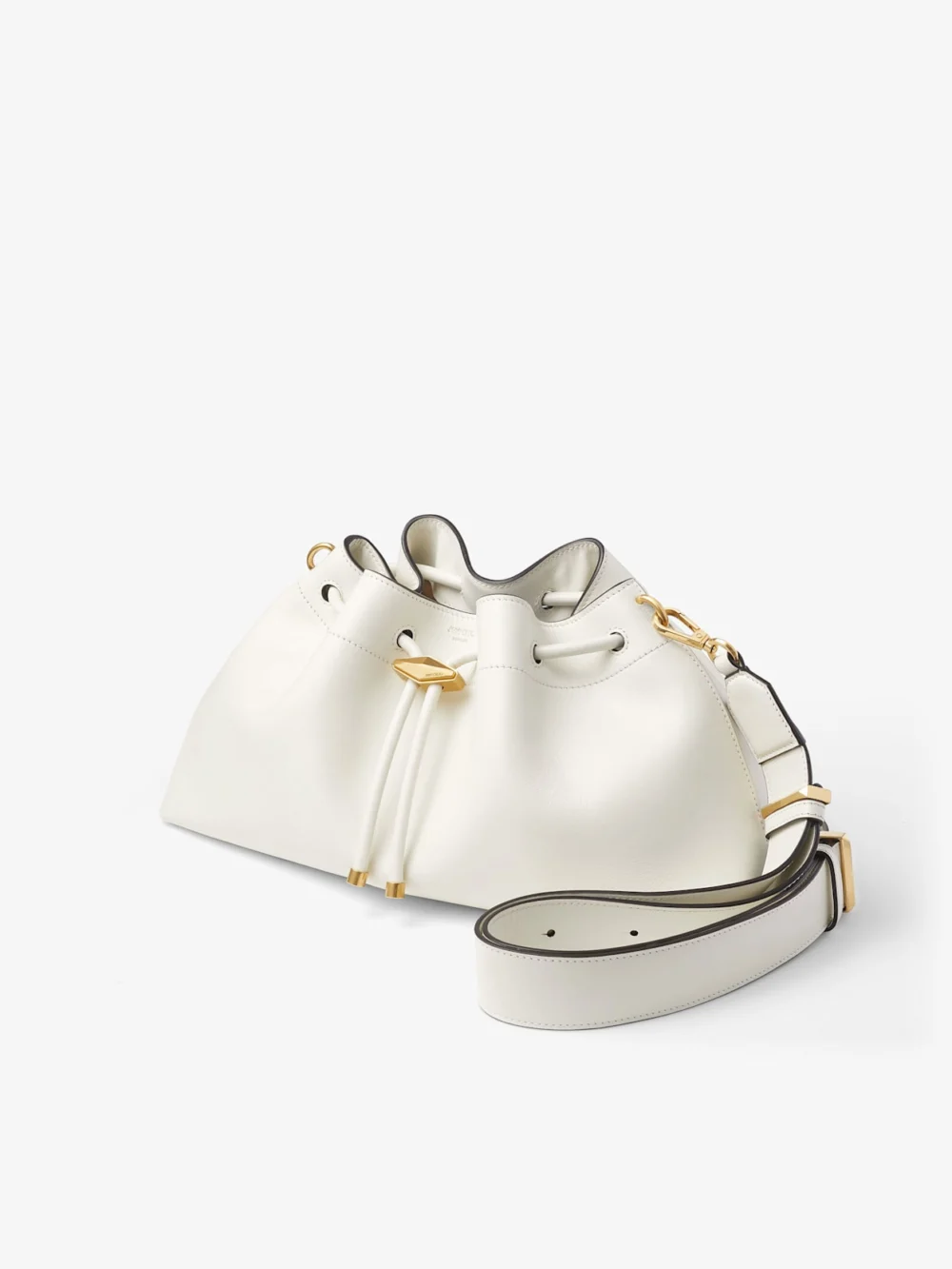 Close-up detail of the Jimmy Choo Cinch Medium Latte Leather Shoulder Bag