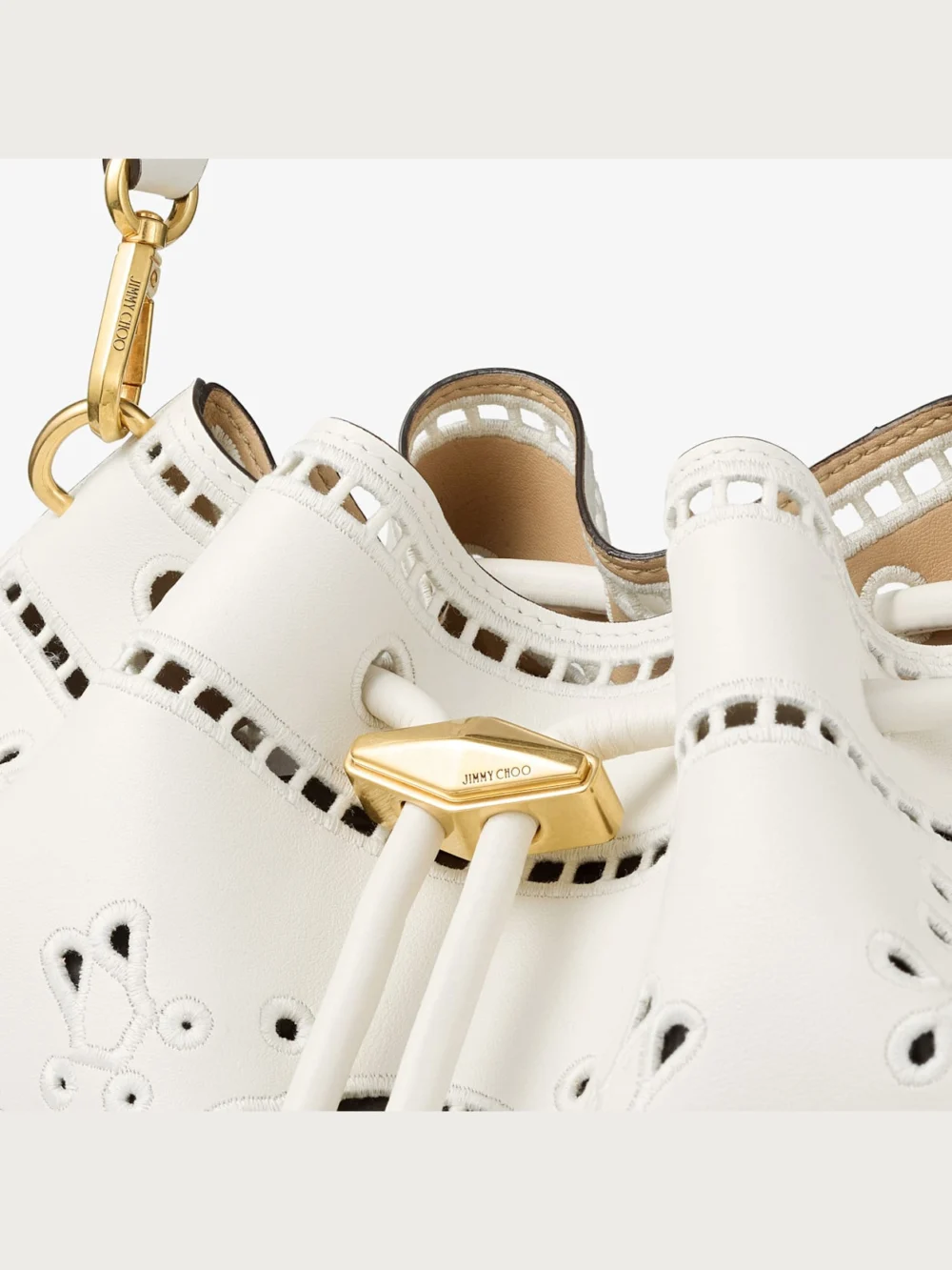 Back view of the Jimmy Choo Cinch Medium Latte Smooth Calf Leather Shoulder Bag with Sangallo Embroidery