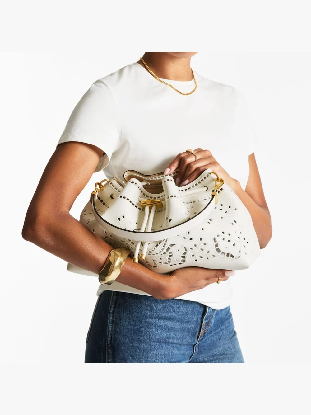 Side view of the Jimmy Choo Cinch Medium Latte Smooth Calf Leather Shoulder Bag with Sangallo Embroidery