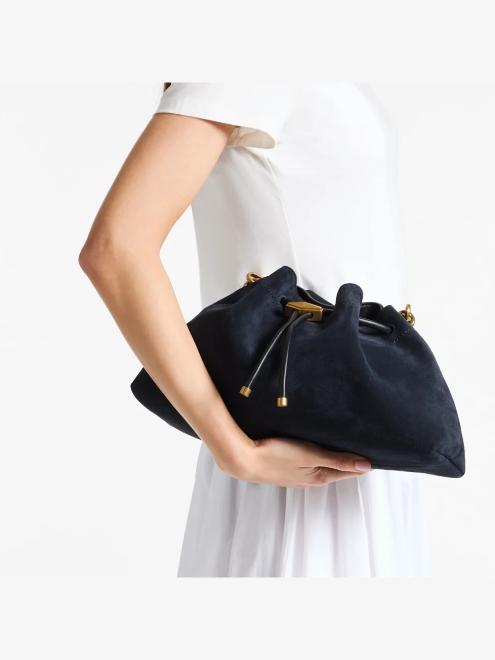 Side view of the Jimmy Choo Cinch Medium Marine Suede Shoulder Bag