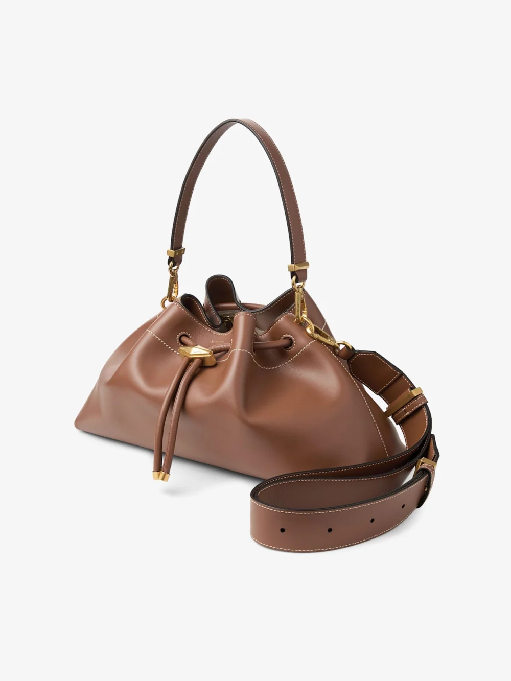 Close-up detail of the Jimmy Choo Cinch Medium Tan Leather Shoulder Bag